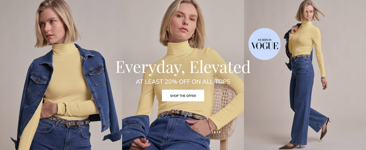 Three-panel fashion advertisement showing a woman modeling a pale yellow mock-neck long-sleeve top with blue denim jackets and blue jeans against a light beige studio background. Large text reads 'Everyday, Elevated' with a 'Shop the Offer' button, and a circular badge says 'As seen in Vogue'.
